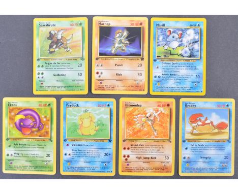 A collection of 7x original vintage 1990's 1999 Wizards Of The Coast WOTC Pokemon The Trading Card Game Pokemon Cards from th