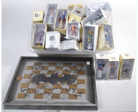 A large collection of x44 DC Comics Chess Collection pieces with deluxe Chess board and a quantity of magazines. Chess set ch