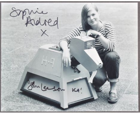 Doctor Who - Sophie Aldred (Ace) and John Leeson (K9 Voice) dual signed autographed 8x10" black and white photograph. Signed 