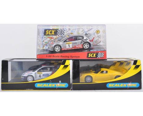 A collection of x3 original Hornby Hobbies and SCX made Scalextric boxed slot racing cars comprising Hornby Hobbies C2449 Por