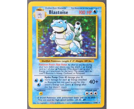 An original vintage 1990's Wizards Of The Coast Pokemon The Trading Card Game Pokemon Card 2/102 Blastoise from the original 