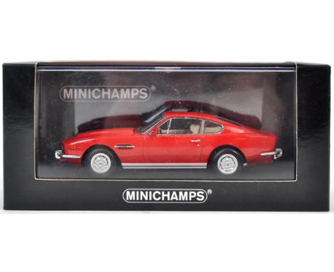 An original Minichamps made 1/43 scale precision diecast model No. 400 137721 Aston Martin V8 Coupe red. The model appearing 