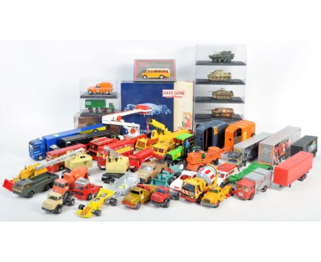 A large collection of assorted diecast model cars, buses and other vehicles of various scales and makers to include Lledo Day