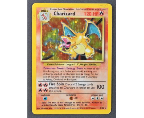 An original vintage 1990's Wizards Of The Coast 1999 Pokemon Trading Card Game Pokemon Card Charizard holographic shiny card 