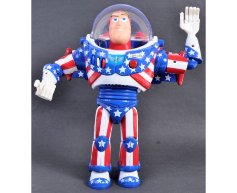 An original Thinkway made Disney Pixar Toy Story And Beyond Buzz Lightyear USA Stars and Stripes talking action figure. The b