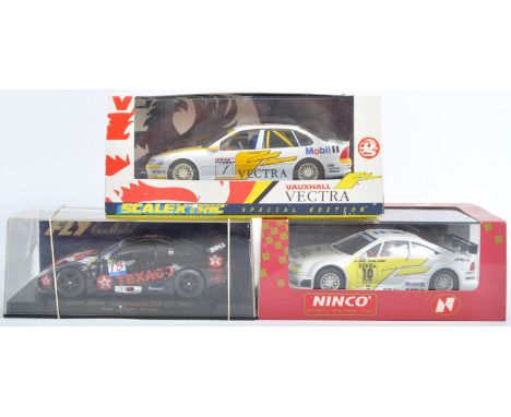 A collection of x3 boxed Scalextric and other slot racing comprising Hornby Scalextric C2001 Vauxhall Vectra, Fly Car Model N