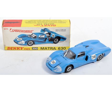 An original vintage Dinky Toys boxed diecast car model No. 200 Matra 630 race car. Blue bodywork with lift off bonnet panel a