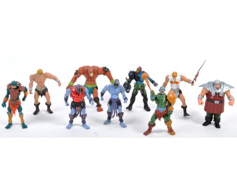 A collection of x9 assorted circa 2001 Mattel made MOTU Masters Of The Universe playset action figures comprising He-Man, Ske