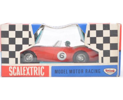 An original vintage 1960's Triang / Tri-ang made Scalextric 1/32 scale slot racing car C93 ' Austin Healey 3000 ' In red with