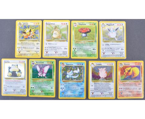 A collection of 9x original vintage 1990's 1999 Wizards Of The Coast WOTC Pokemon The Trading Card Game Pokemon Cards from th