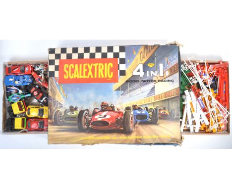 A collection of assorted vintage Tri-ang / Triang and Hornby Scalextric slot car racing items comprising a boxed set No. 80 c