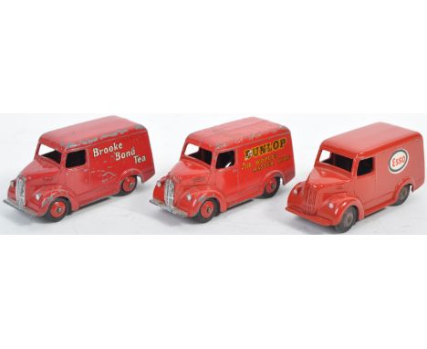 A collection of x3 original vintage Dinky Toys diecast advertising related Trojan vans comprising 450 Esso, 451 Dunlop and 45