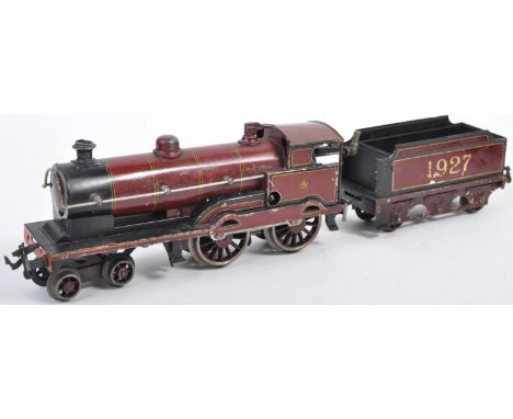 An original vintage Bassett-Lowke 0 gauge tinplate clockwork model railway trainset locomotive engine and a maroon livery 192