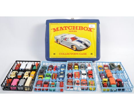 An original vintage vinyl Matchbox Series Collector's Case&nbsp;with an assortment of diecast vehicles by makers to include H