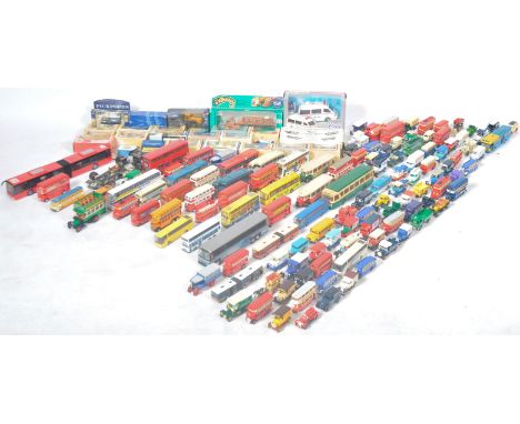 A large collection of assorted diecast model cars, buses and other vehicles of various scales and makers to include Corgi, Ll