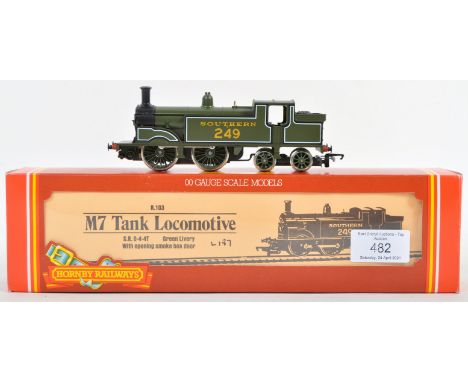 An original vintage Hornby 00 gauge model railway trainset locomotive engine No.103 SR Southern Railways Class M7 in green li