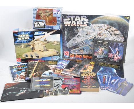 A large collection of assorted Star Wars model kits, playsets and memorabilia items to include ERTL Cut-Away Millennium Falco