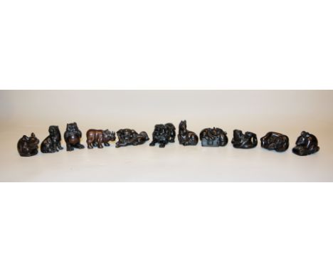 11 japanische Netsuke aus Edelholz, Tierfiguren aller ArtAlle Tiere qualitätsvoll geschnitzt aus dunklem Hartholz und in Kart