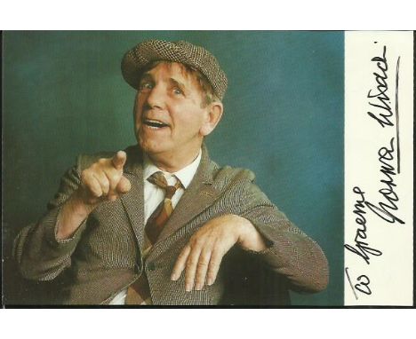  Norman Wisdom signed 6 x 4 colour cheeky flat cap photo to Graham. Good condition 
