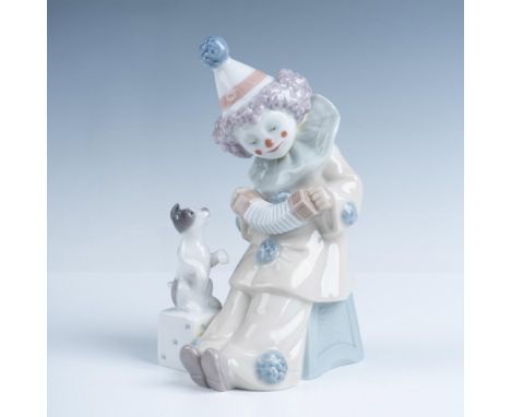 Adorable Pierrot depicted playing music for small dog. Finished with gloss finish. Lladro backstamp. Artist: Jose PucheIssued