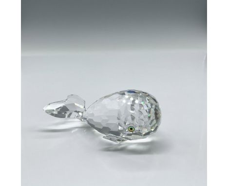Cheerful crystal figure is made from clear crystal and has green-black eyes and a frosted mouth. Swarovski backstamp. 014483.