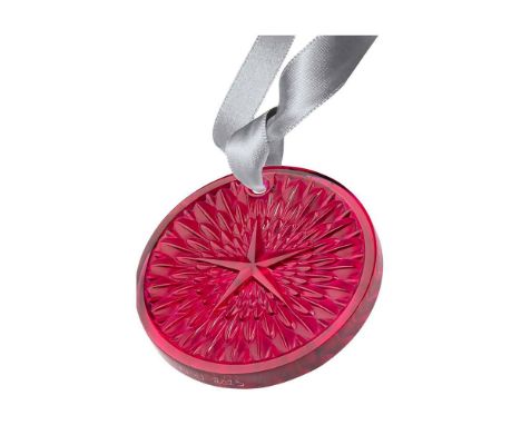 Factory sealed, the crystal 2023 annual Christmas ornament features an intricate star and light pattern. This item includes i