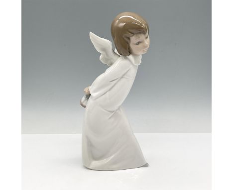 Glossy figure with wings holding a lamp. Lladro backstamp. 1004960. Artist: Angel FaroleroIssued: 1977 - CurrentDimensions: 4