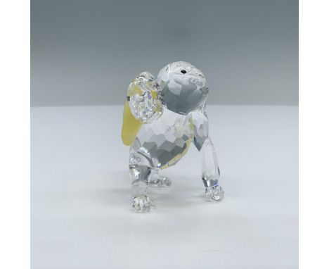 Part of the Rare Encounters series. Lead crystal gorilla carrying frosted crystal bananas with jet black crystal eyes. Swarov