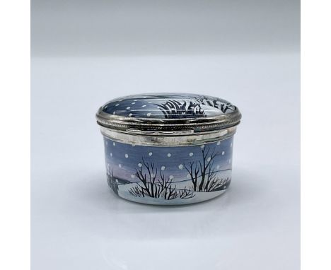 This charming mini enamel box features an enchanting snowy landscape. This item has its original box measuring 3.25"L x 2.75"