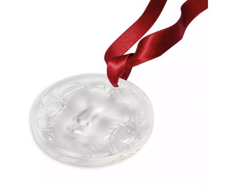 Factory sealed, the clear crystal 2022 annual Christmas ornament features iconic Masque de Femme motif, depicting the face of