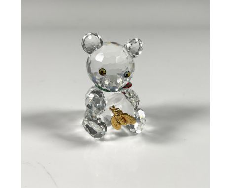 Figure from When We Were Young theme, featuring a bear cherishing its honey pot adorned with an attached golden colored bee f