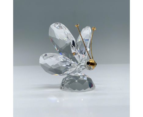Spectacular clear crystal butterfly with crystal tipped gold antennae. Swarovski swan mark. This item has its original box. B