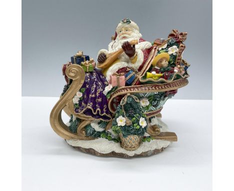 Tune: Jingle Bells. Features a whimsically intricate design of Santa Claus on a sleigh full of presents. This item has its or