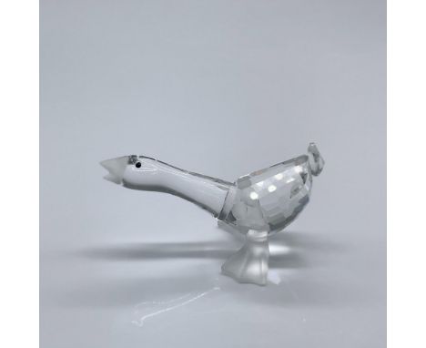 This figure is made from clear facetted crystal, with black eyes, and a frosted beak and feet. This item has its original box