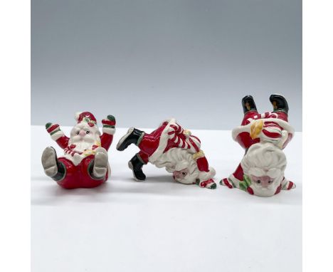 Holiday Sweet Holiday tumblers. Includes three adorable Santa Claus figures in fun poses. Fitz and Floyd original tag. Talles