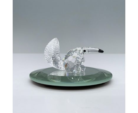 Originally part of the "Endangered Species" collection. This anteater is sitting down with its head facing forward. Its snout