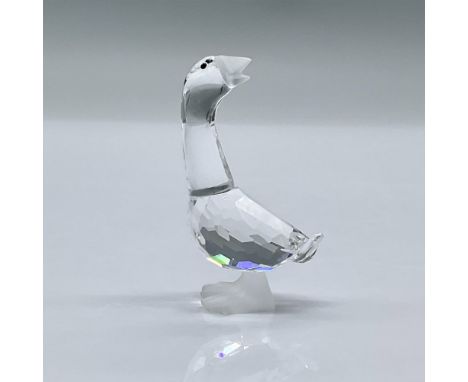 This figure is made from clear facetted crystal, it has black eyes with a frosted beak and frosted feet. This item has its or