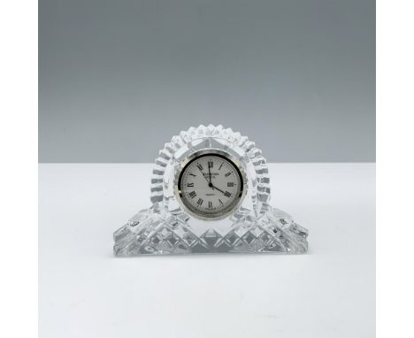 Beautiful crystal bodied desk clock displaying a diamond cut pattern and a Quartz clock face with roman numerals. Waterford a