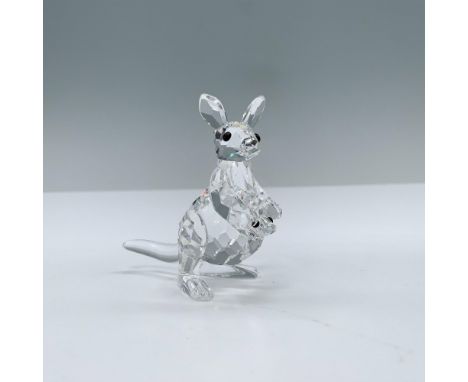 A captivating clear crystal kangaroo, gracefully standing on two legs, while her adorable baby joey peers curiously from her 
