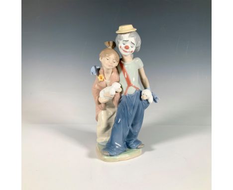 A glossy figure of two friends. A clown with a dog in his pocket has his arm around a woman who is holding a dog. 2000 LCS Fi