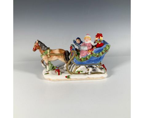 This delightful figure depicting children being pulled on a sleigh by a pony is inspired by the Kennedy's 1960 Christmas card