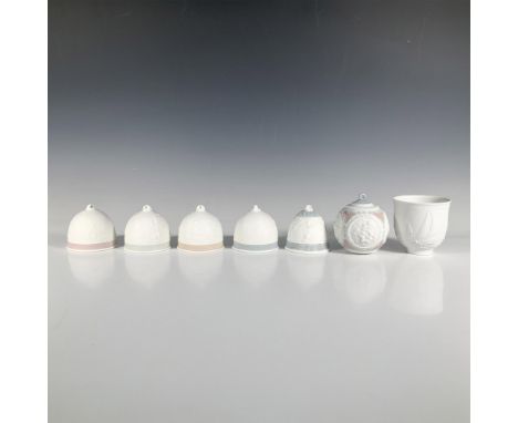 A set of six Lladro bells and one ornament, including the Spring Bell 7613, Summer Bell 7614, Fall Bell 7615, Winter Bell 761