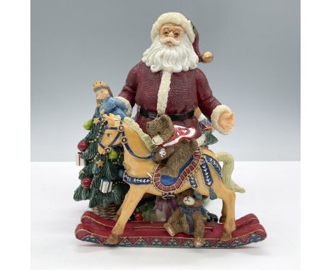 Tune: Toyland. Features Santa Claus surrounded by wonderful Christmas gifts. This item has its original box, dimensions: 8.75