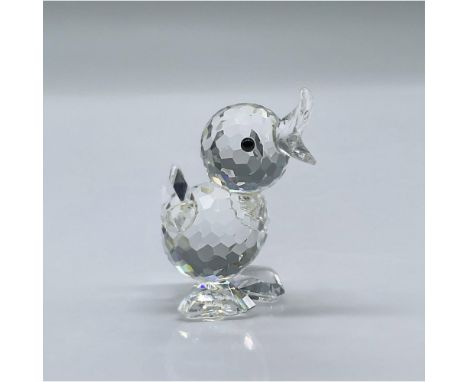 This charming little figure has crystal facetted body, a molded open beak, and black eyes. This item has its original box mea