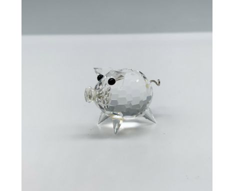 Stunning little figure of a pig with a clear crystal faceted body and black eyes as well as a curled tail. This figure was pa