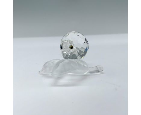 Adorable and whimsical piece of two clear snails on a frosted leaf. Swarovski marked. This item has its original box. Box mea