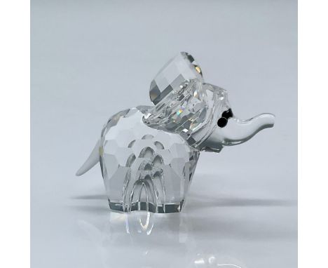 A precious crystal elephant with a frosted tail. This item has its original box measuring 3.25"L x 3.25"W x 2.5"H. Certificat