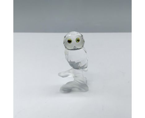 Magnificent figure of a clear crystal owl with a frosted face and base as well as multicolored eyes. This figure was part of 