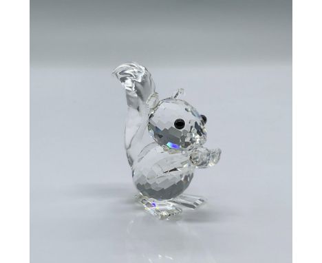 This figure is made from clear crystal and has black eyes. This variation has small ears. This item has its original box meas