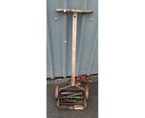 Vintage pull along mower 